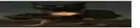 a circle of fire with a black hole in the middle of it .