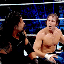 Roman Reigns Dean Ambrose GIF - Roman Reigns Dean Ambrose Punch GIFs