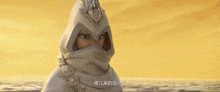 a person wearing a white hooded cape with chinese writing on it