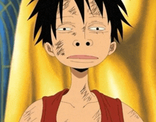 monkey d luffy from one piece is wearing a red shirt and has scars on his face .