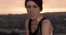 Tongue Out Miley Cyrus GIF