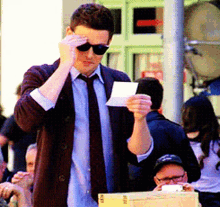 Cory Monteith Vote GIF - Cory Monteith Vote Take Off Sunglasses GIFs