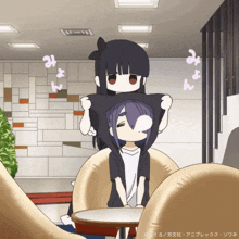 a cartoon of a girl holding another girl 's head with the words " みょん " on the bottom right