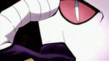 a close up of a cartoon character 's mouth with a red eye and a white tongue sticking out .