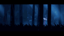 a person with a mask on their face is standing in a dark forest holding a ball .