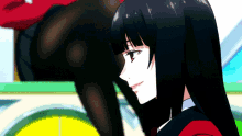 a girl with long black hair is smiling and looking at something