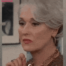 a woman with gray hair is asking if something funny