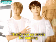 two young men standing next to each other with the words thank you so much for coming