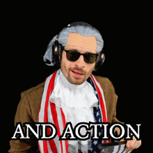 a man wearing a wig and sunglasses says " and action " in front of him