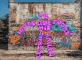 a wall with graffiti on it that says tu eres que too