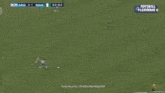 a soccer player is kicking a soccer ball on a field