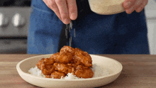 Adding Sesame Seeds Brian Lagerstrom GIF - Adding Sesame Seeds Brian Lagerstrom Sprinkling Sesame Seeds GIFs