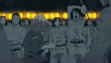 a group of people are gathered in a dark room and one of them has the number 13 on his shirt
