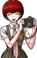 a girl with red hair is holding a canon camera in her hand