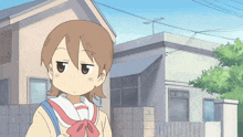 a girl with brown hair is standing in front of a house with an antenna on top of it