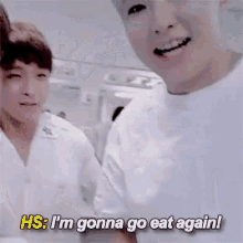two young men are standing next to each other and one of them is saying `` hs : i 'm gonna go eat again ''