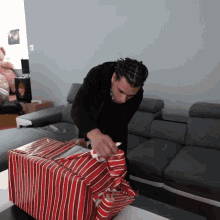 Unwrap The Gift Cyrus Dobre GIF - Unwrap The Gift Cyrus Dobre Dobre Brothers GIFs