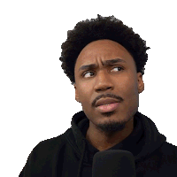 a man wearing a black hoodie and a microphone has his eyes closed