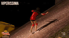 a woman is sliding down a ramp with the words viperissima written above her