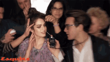 Famous Interview GIF - Famous Interview Fixing Hair GIFs