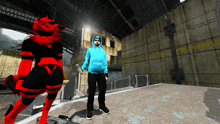 a man in a blue hoodie stands in front of a red monster