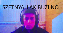 a man wearing headphones with the words " szetnyallak buzi no " written above him