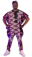 a man wearing a purple and white outfit with white shoes