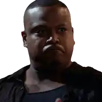 a man in a black shirt is making a silly face