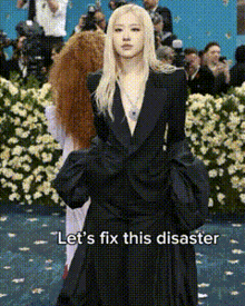 a woman in a black dress with the words let 's fix this disaster written below her