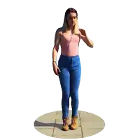 a girl in a pink tank top and blue jeans is dancing