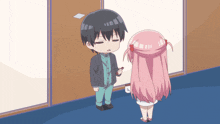 a man and a girl are standing next to each other