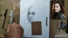 a drawing of a woman 's face is made in animatica
