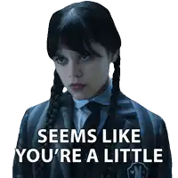 a sticker of a girl with pigtails and the words seems like you 're a little