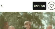a picture of a group of people standing next to each other with a caption button and a heart .