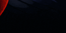 a dark background with a few lines of light on it