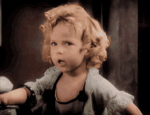 shirley temple shakes head covers eyes im so tired of it all upset