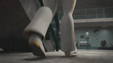 a cartoon character is standing in a hallway with a staircase behind him