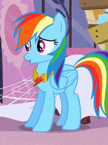 rainbow dash from my little pony is wearing a bow tie