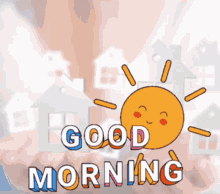 a hand holding a sun with the words good morning written on it