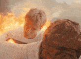 a man in a white sweater is surrounded by flames and the word kepler is above him