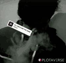 a black and white photo of a person smoking a hookah with a sticker that says all girls are the same