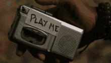 play me jigsaw pressing play tape recorder