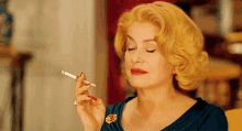 Catherine Cigar GIF - Catherine Cigar Smoking GIFs