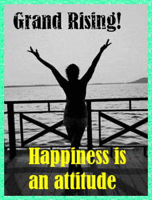 a woman is standing on a dock with her arms in the air and a quote that says grand rising happiness is an attitude