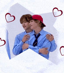 a couple of boys hugging each other with hearts in the background