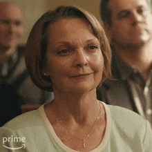 Smiling Annette O'Keefe GIF
