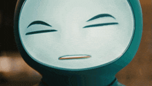 a close up of a robot 's face with a smiley face on it