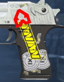 a close up of a gun with a sticker on the grip that says ' survival '