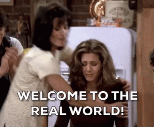 gif from Friends. Monica hugs Rachel and says "Welcome to the real world! It sucks. You're gonna love it."
