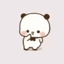 a cartoon panda bear is holding a piece of chocolate in its mouth .